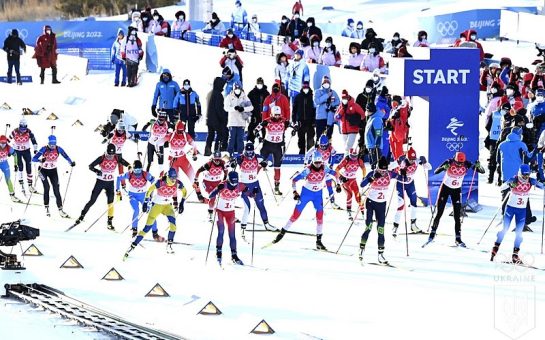 biathlon relayers at the start line