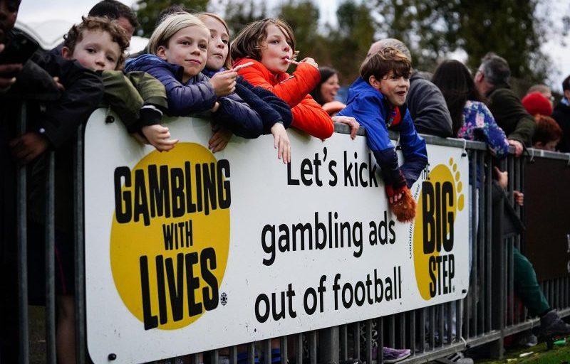 a "let's kick gambling out of football" banner