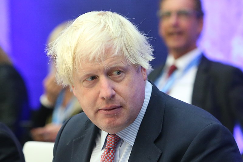 Boris Johnson looks over his shoulder