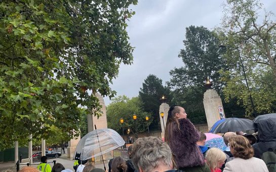 public line the streets waiting for the Queen's coffin to arrive on its way to Buckingham Palace