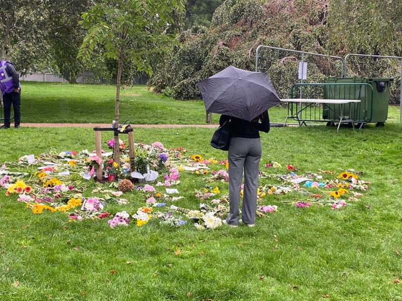 Mourners prepare for the arrival of the Queen's coffin