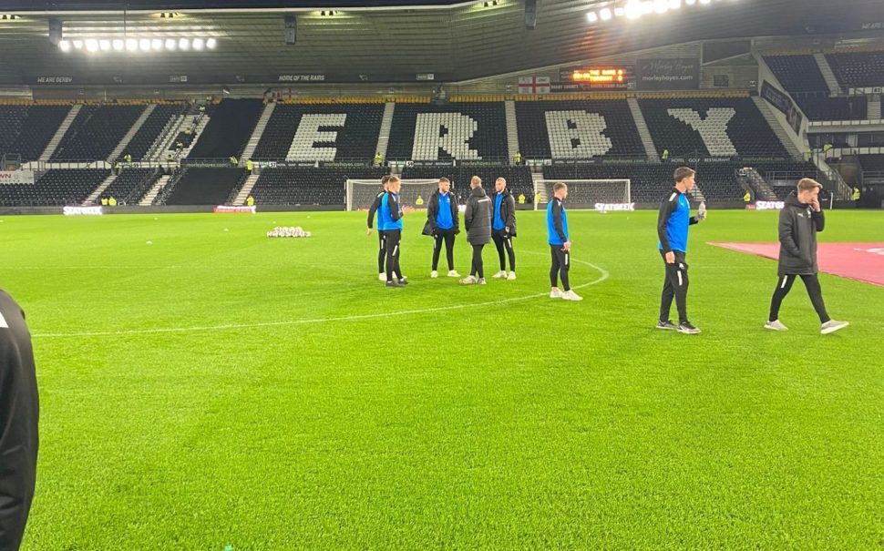 Torquay players walking around the ground
