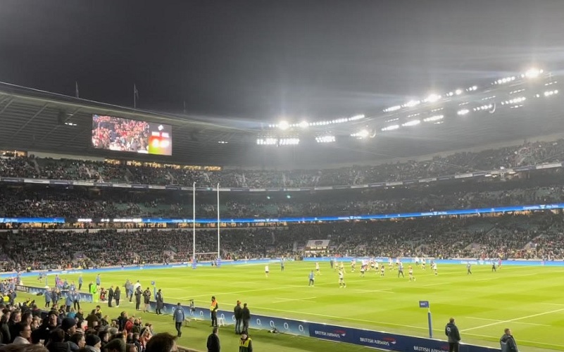 The pitch at Twickenham Stadium under the lights after a match