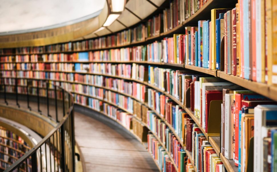 Image of books on shelves in a library