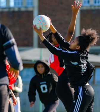 Girls playing netball