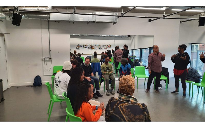 A picture from the special educational needs workshops happening now at Theatre Peckham - showing some of the participants sitting in a circle talking to each other