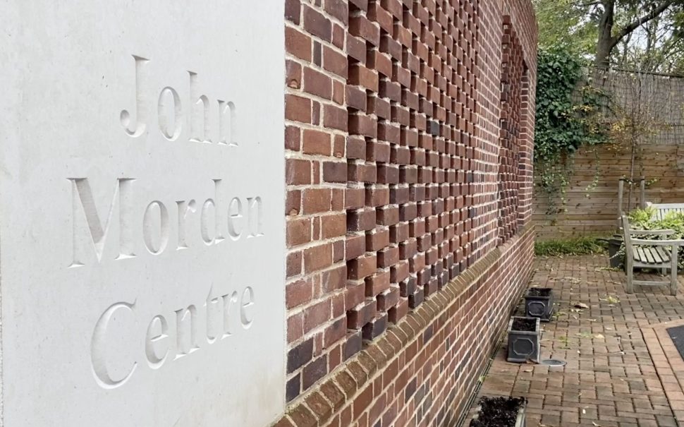 A sign showing the John Morden Centre.