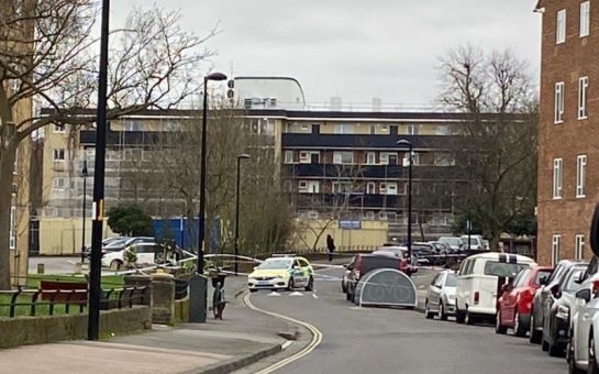 Picture of Bowen Drive with police car blocking off the area.