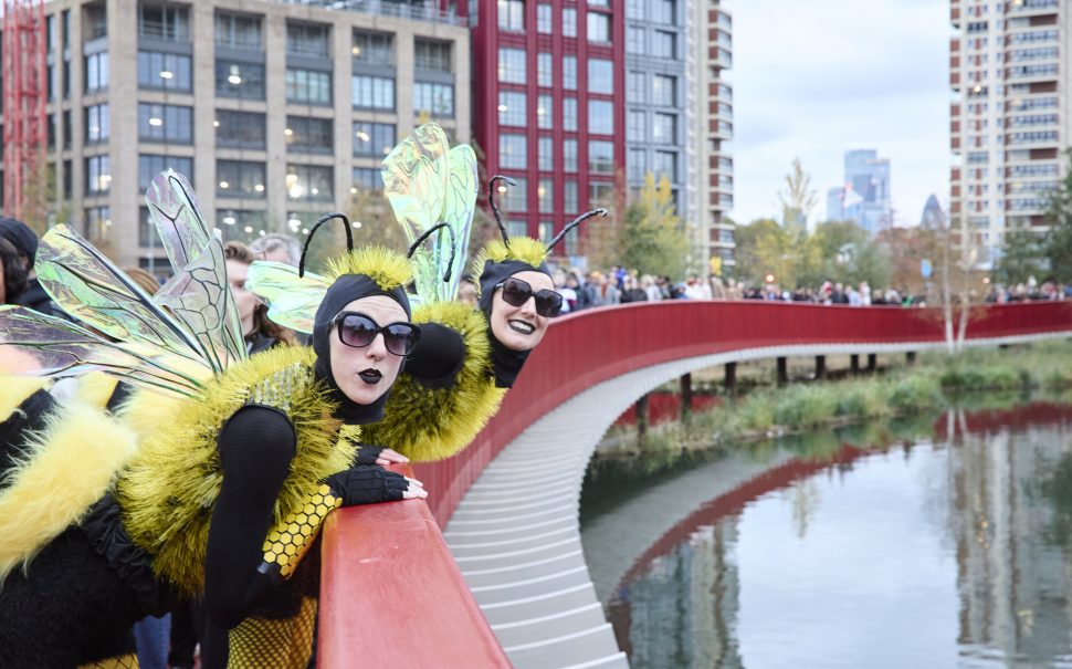 Performers dressed as bees on Asif Khan's new boardwalk at Canada Water