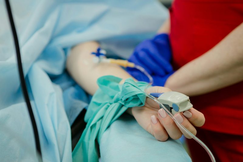 A person putting in an IV