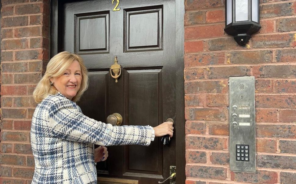 Chief Executive Officer of Westmeria Counselling Services opening the door to the charity's brand-new Bromley counselling hub
