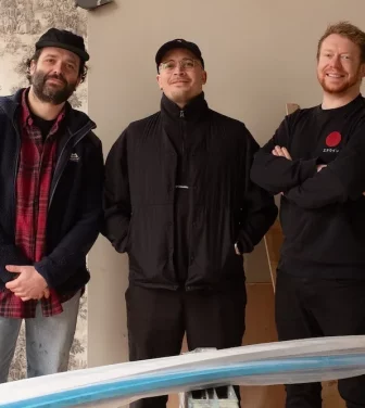The Kerfield Arms team: Adam Symonds, Jay Styler, and Rob Tecwyn standing together, smiling at the pub.