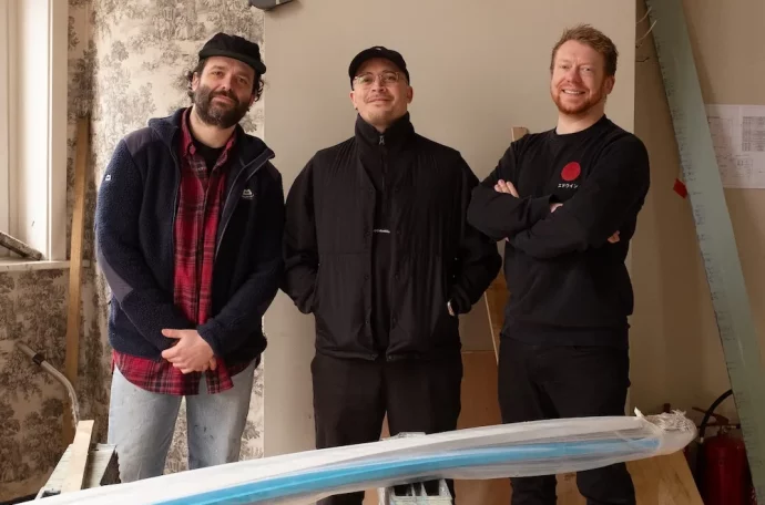 The Kerfield Arms team: Adam Symonds, Jay Styler, and Rob Tecwyn standing together, smiling at the pub.