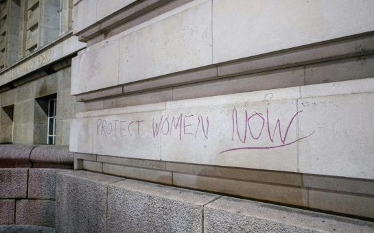 Image of building with graffiti on it
