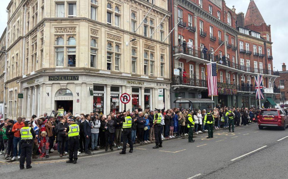 The police keep Trump supporters and protestors off the roads in Windsor at President Trump's second UK state visit
