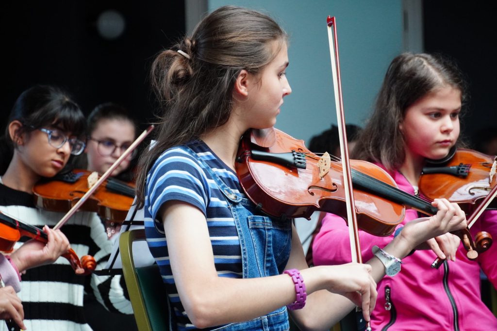 A girl plays the violin