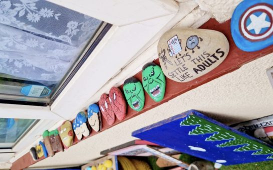 kindness rocks on window ledge