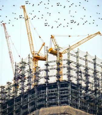 Construction site with cranes (Credit: Free to use from Unsplash/Danist Soh)