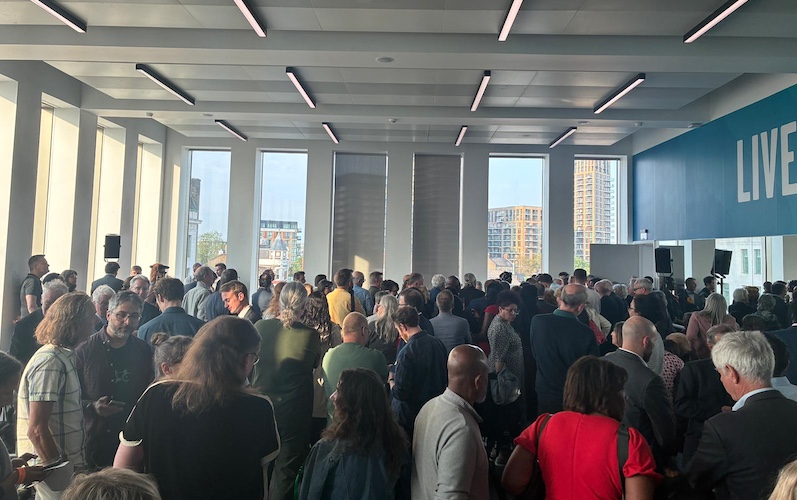 busy announcement hall at Greenwich local election 2026