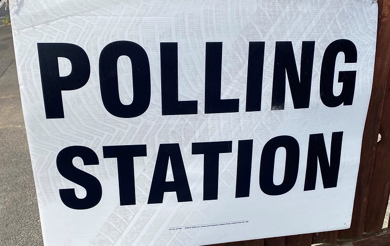 Image of a polling station sign