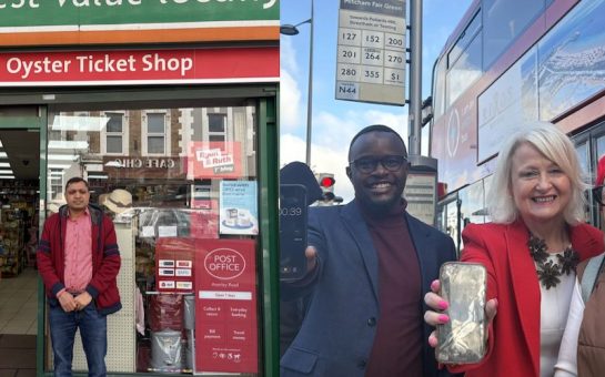 Image of shop owner and Labour members