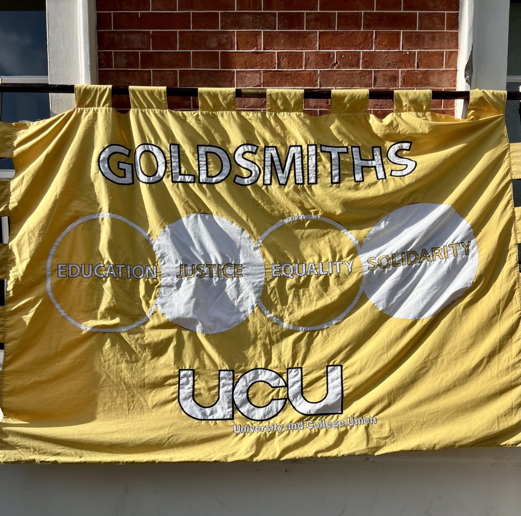 Golsmiths University and College Union at Goldsmiths strike banner saying education, justice, equality and solidarity