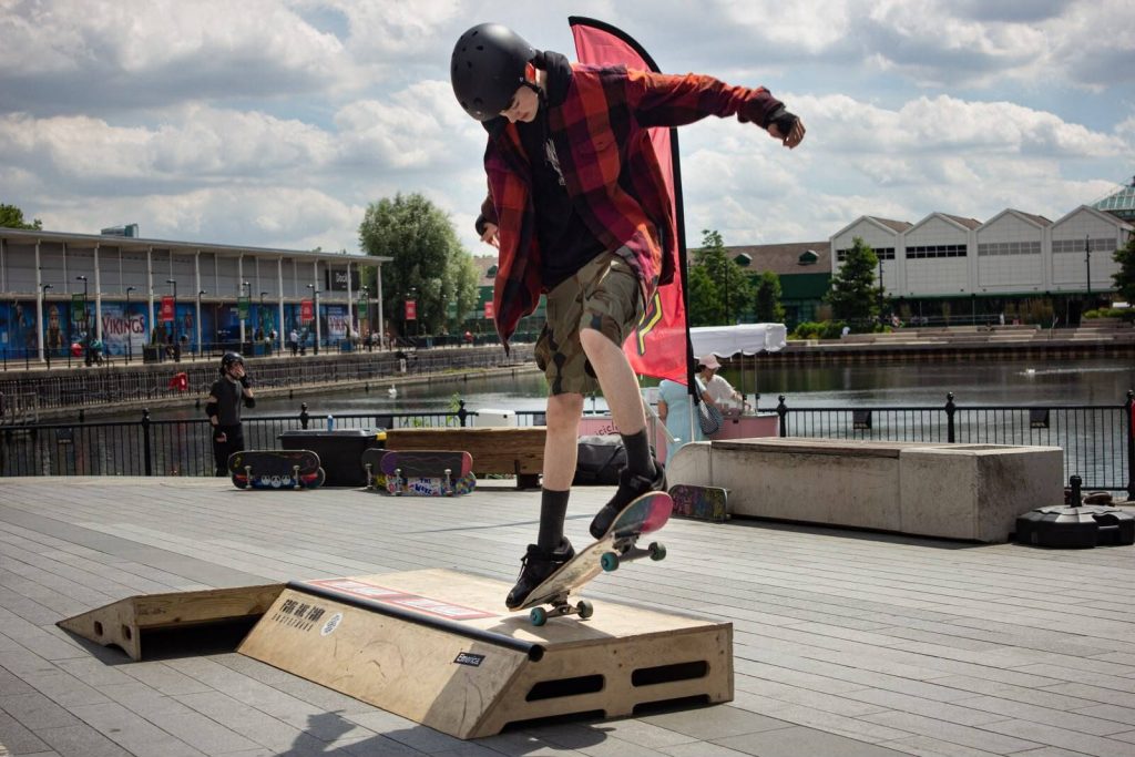 Phoneix Love, 15, attempts a jump off a ramp on his skateboard during a Skate Haven session at Canada Water docks 