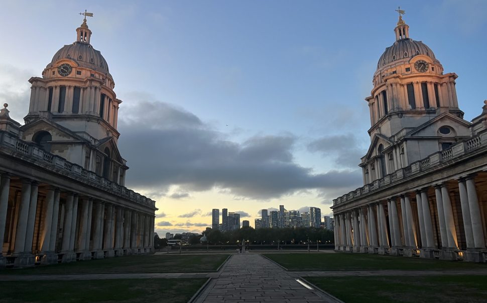 Image of the University of Greenwich's main campus, two towers photographed at sunset