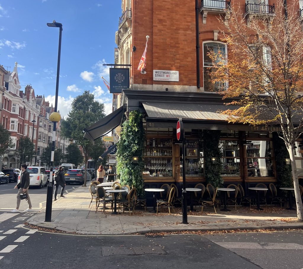 The Cavendish pub on New Cavendish Street in Marylebone, with outdoor seating and pedestrians nearby
