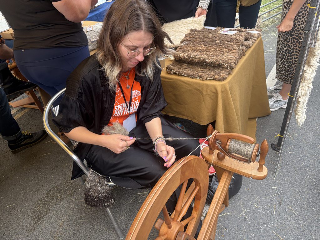 Wool spinner Jenny Judova demonstrating wool spinning at the Woolmen’s Livery Fair