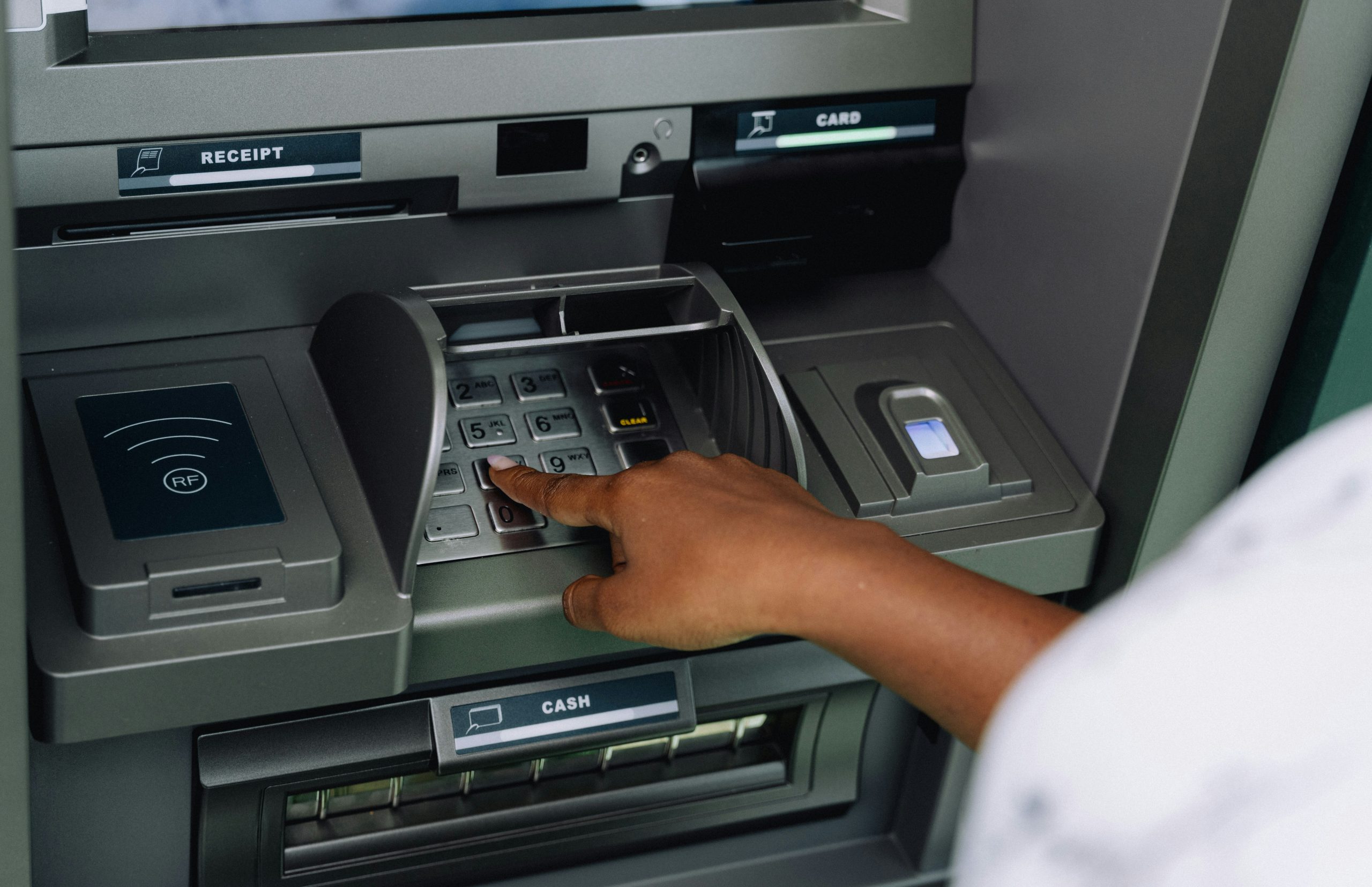 Costumer using an ATM Machine